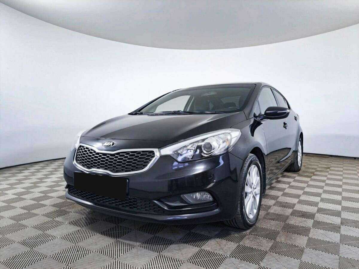 Kia Cerato 2014 года с пробегом. Посмотреть фото