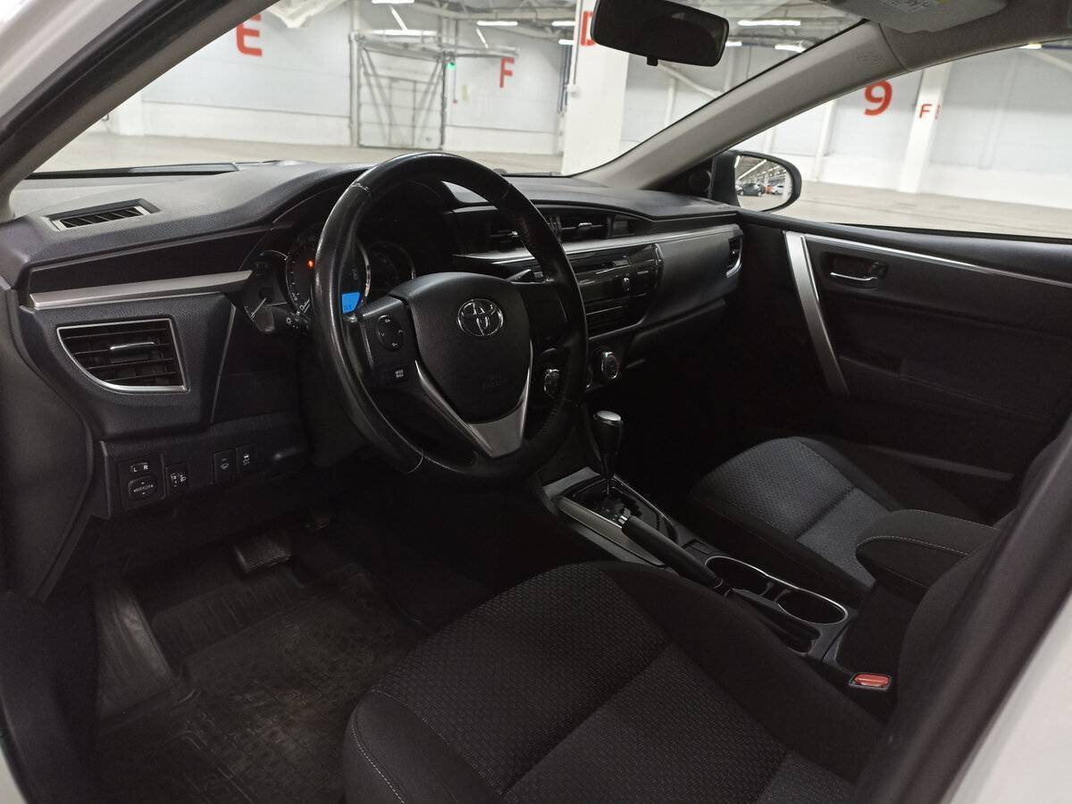 Toyota Corolla 2013 года с пробегом. Фото: #15