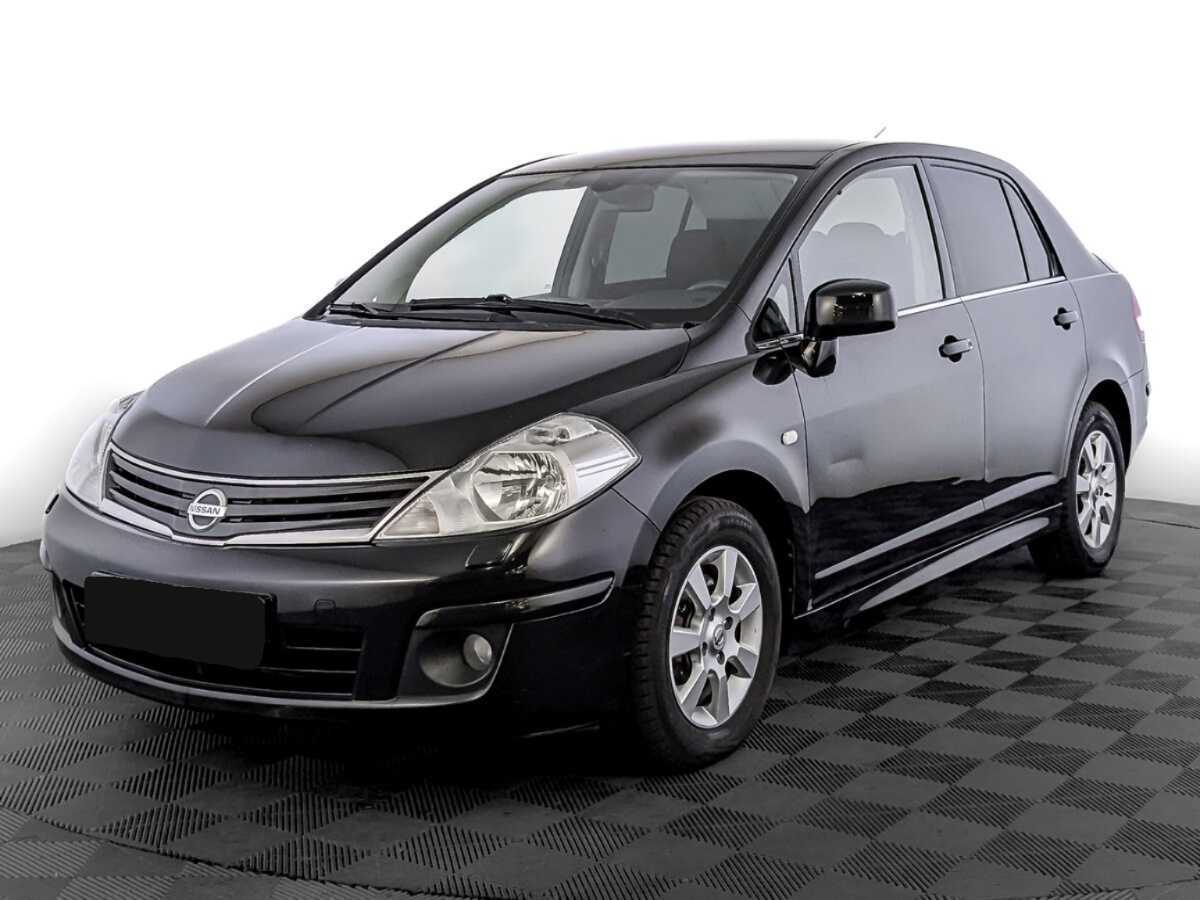 Nissan Tiida 2013 года с пробегом. Посмотреть фото