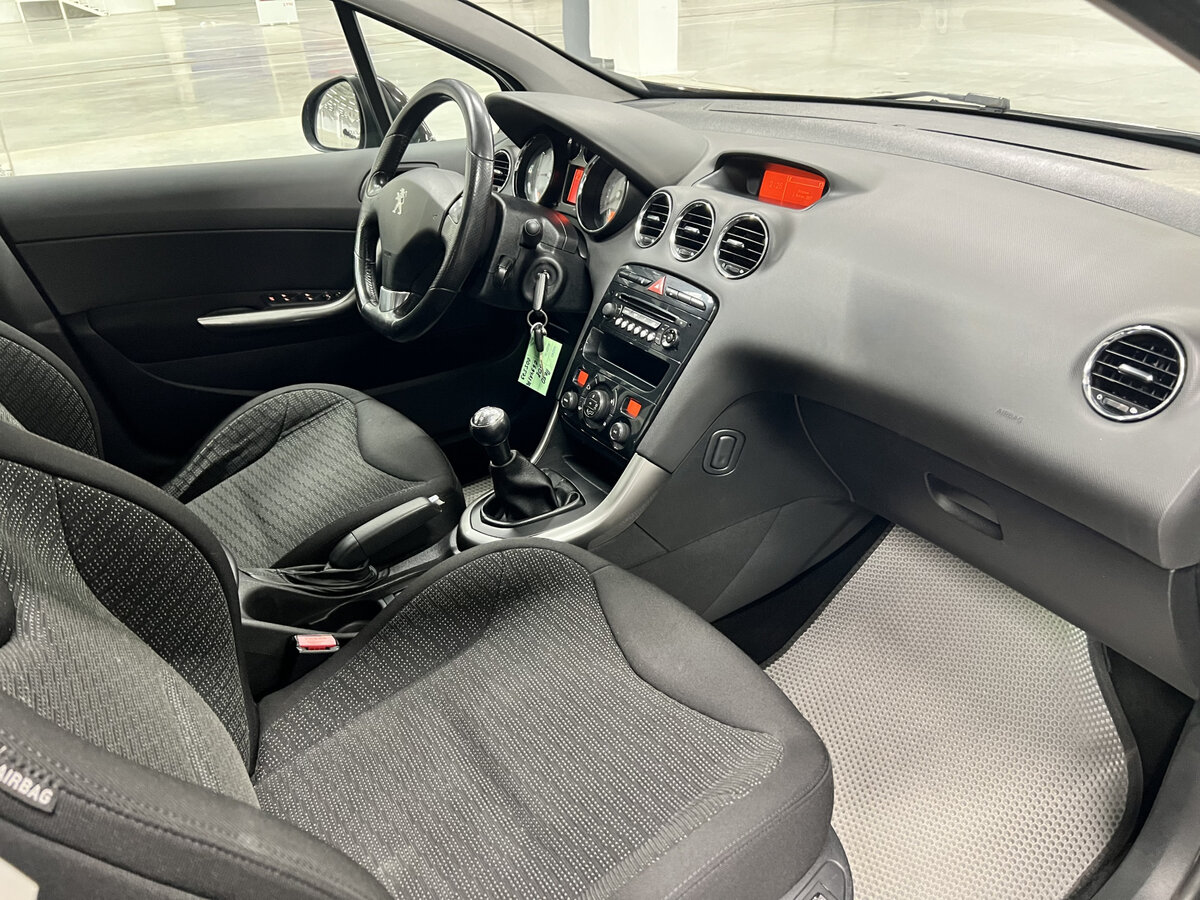 Peugeot 308 2012 года с пробегом. Фото: #10