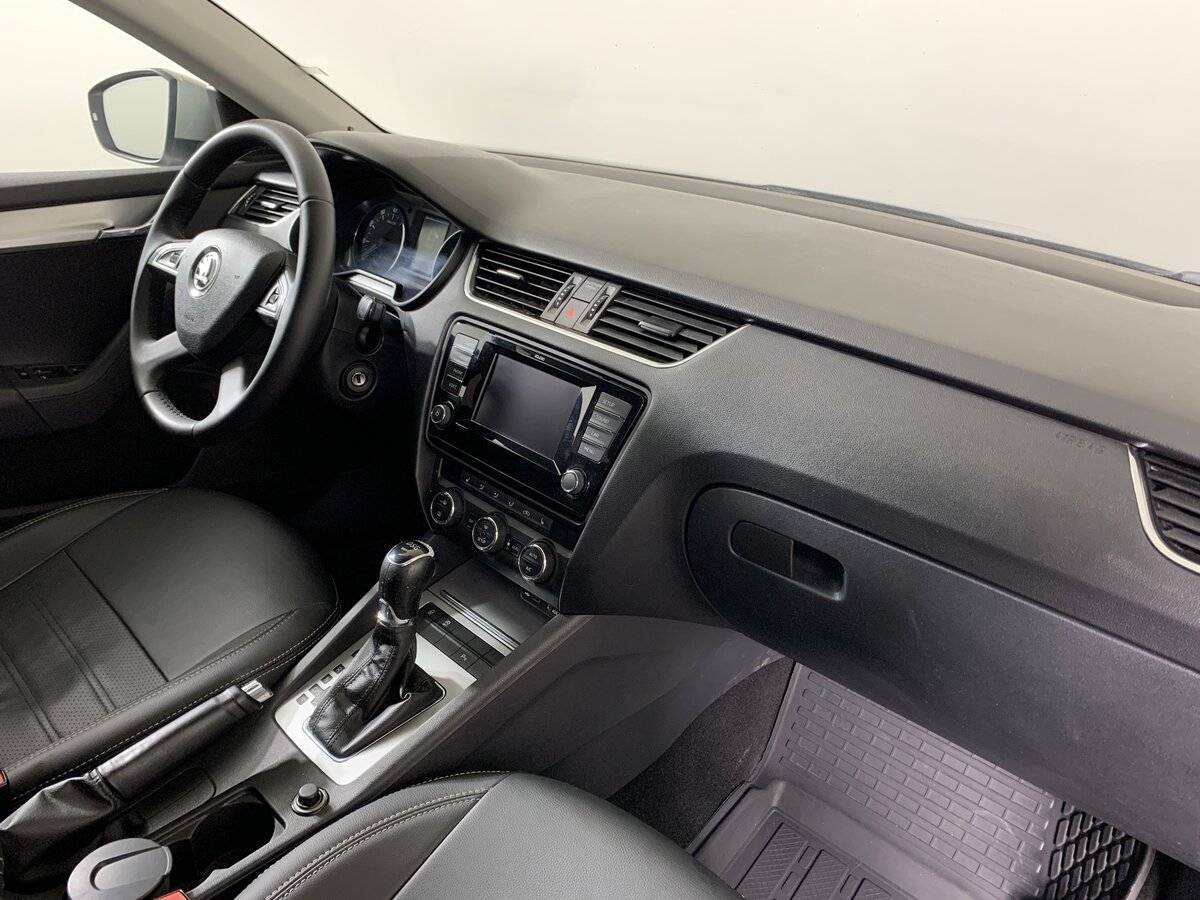 Skoda Octavia 2013 года с пробегом. Фото: #12