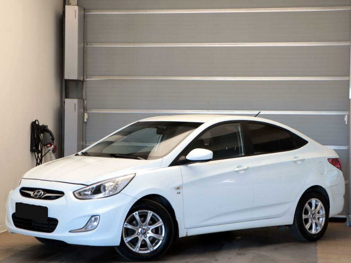 Hyundai Solaris 2013 года с пробегом. Посмотреть фото