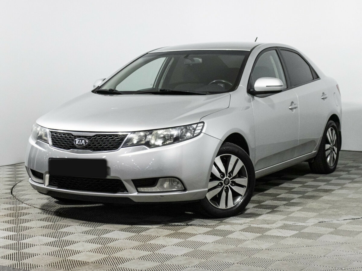 Kia Cerato 2012 года с пробегом. Посмотреть фото