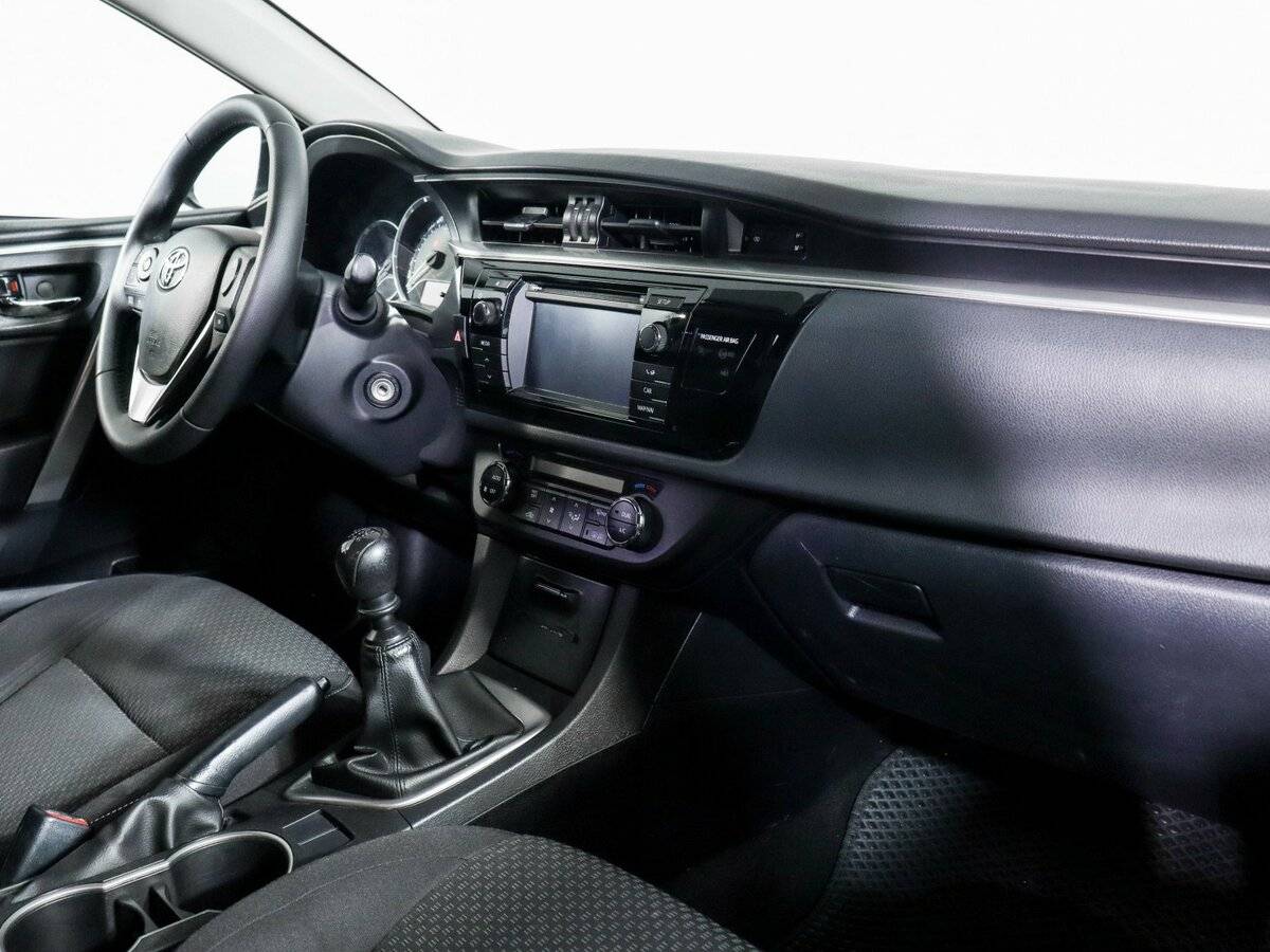 Toyota Corolla 2014 года с пробегом. Фото: #5