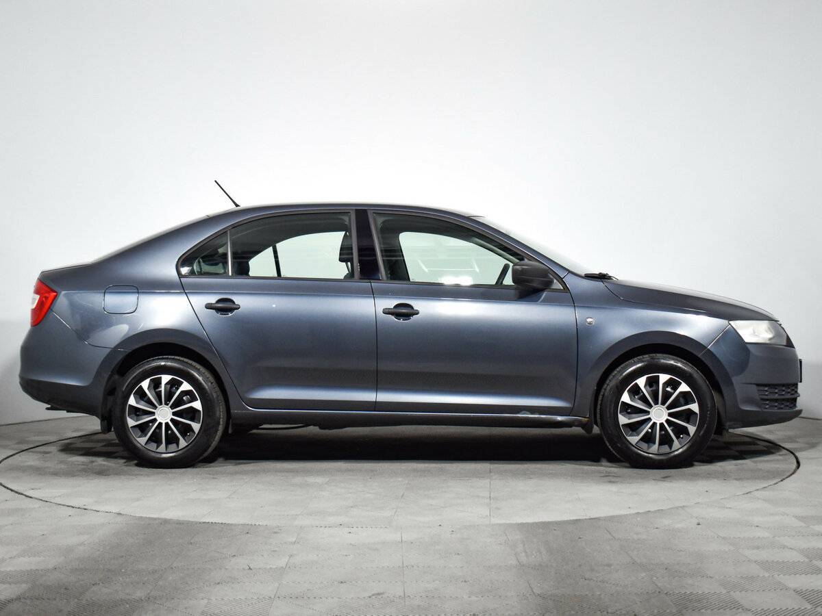 Skoda Rapid 2014 года с пробегом. Фото: #3