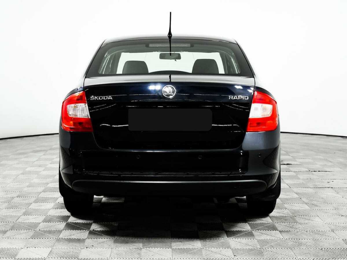 Skoda Rapid 2014 года с пробегом. Фото: #5