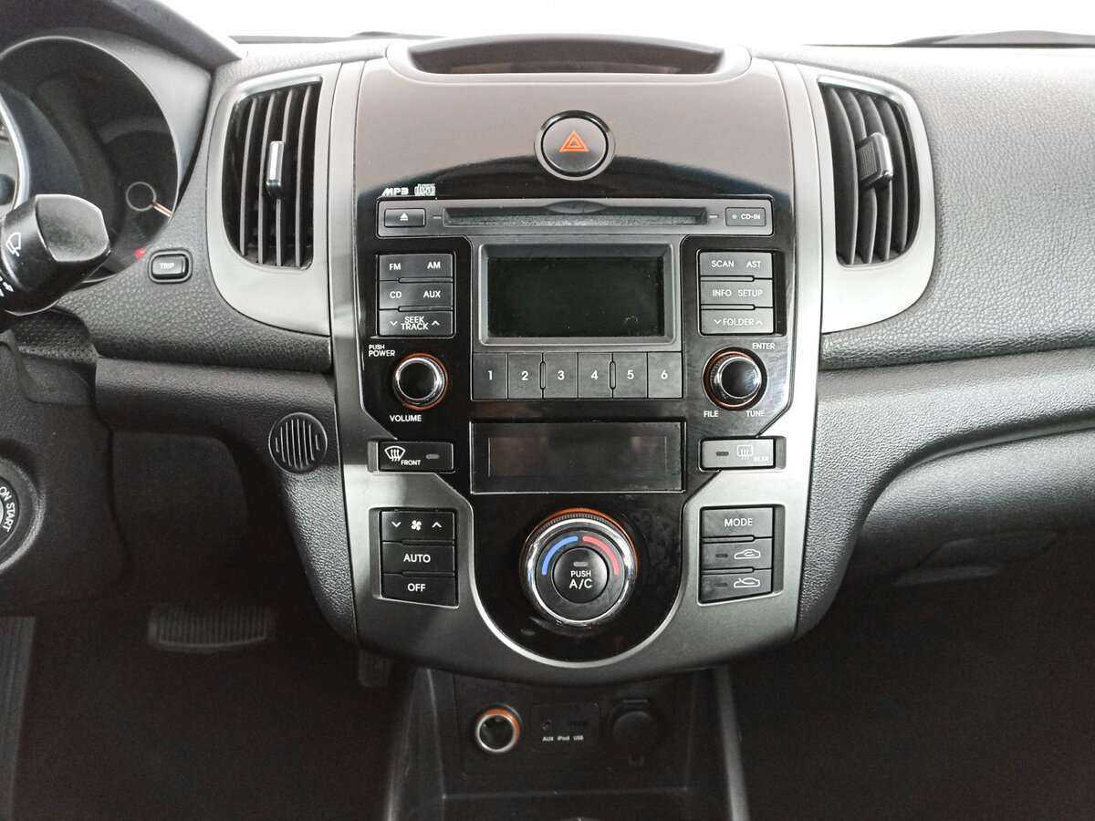 Kia Cerato 2012 года с пробегом. Фото: #12
