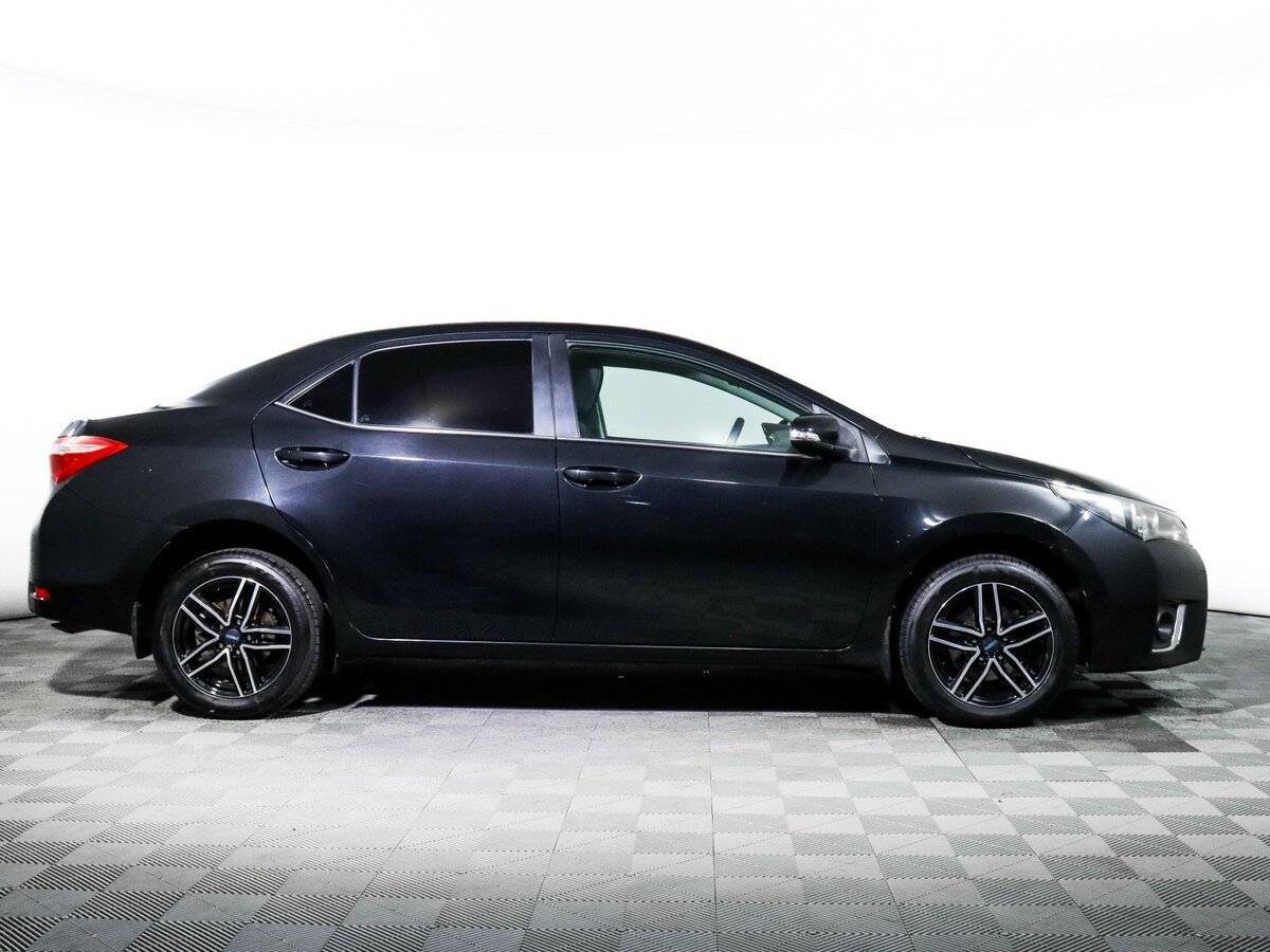 Toyota Corolla 2014 года с пробегом. Фото: #3