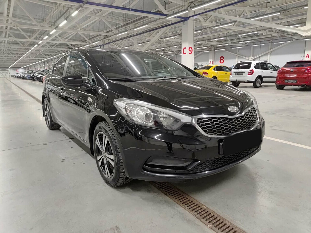 Kia Cerato 2013 года с пробегом. Фото: #2