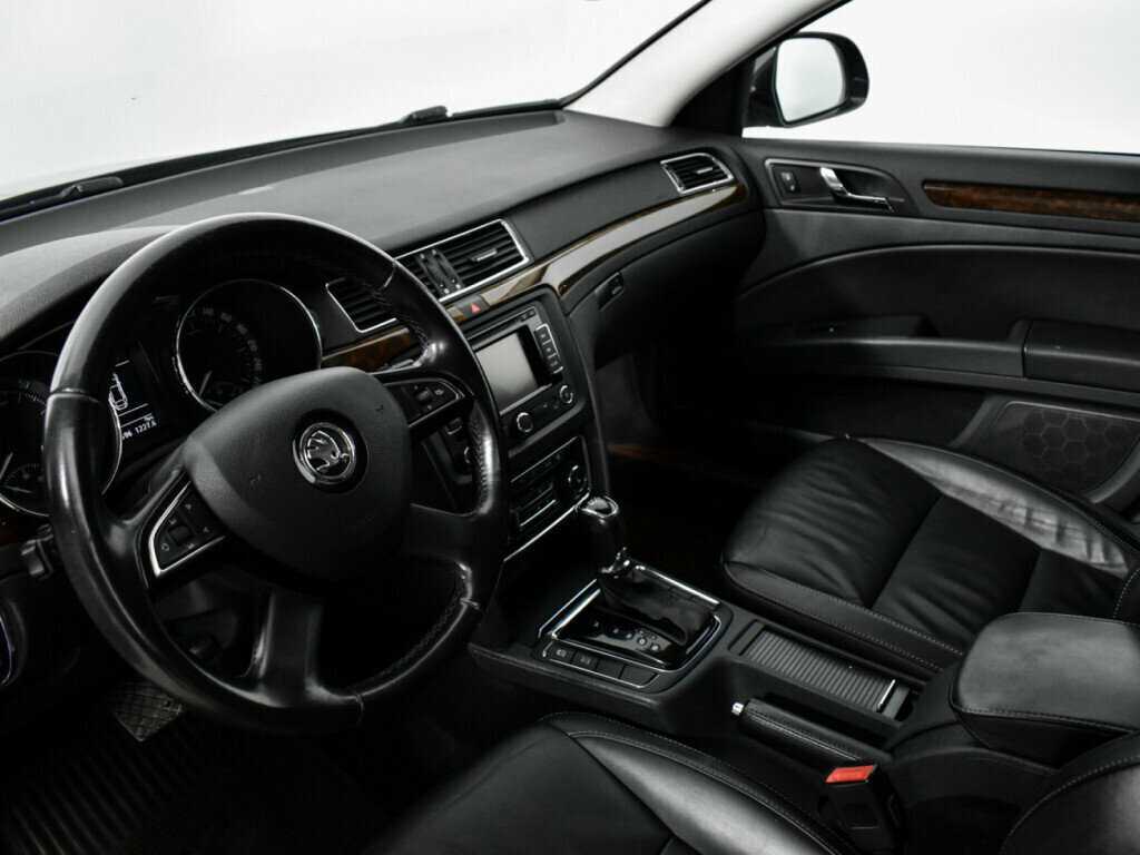 Skoda Superb 2013 года с пробегом. Фото: #6