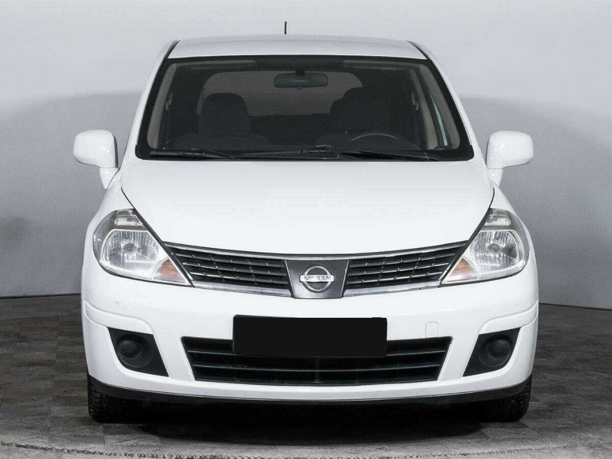 Nissan Tiida 2013 года с пробегом. Фото: #1