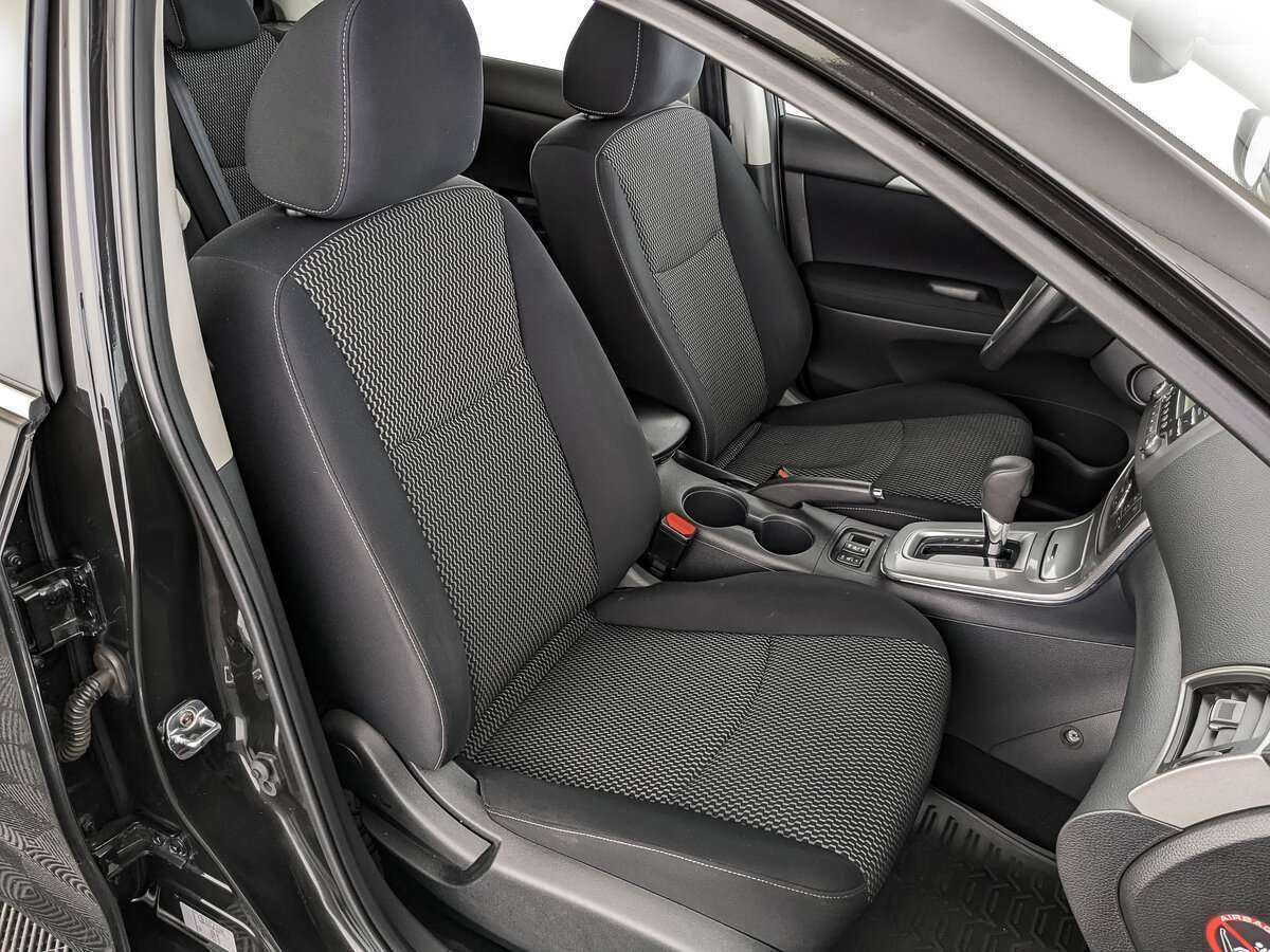 Nissan Tiida 2015 года с пробегом. Фото: #19