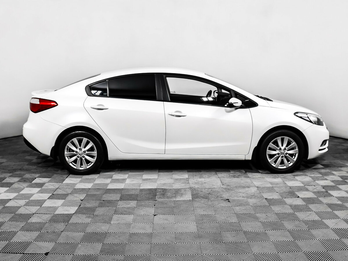 Kia Cerato 2013 года с пробегом. Фото: #3