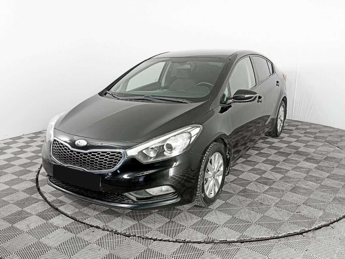 Kia Cerato 2013 года с пробегом. Фото: #0