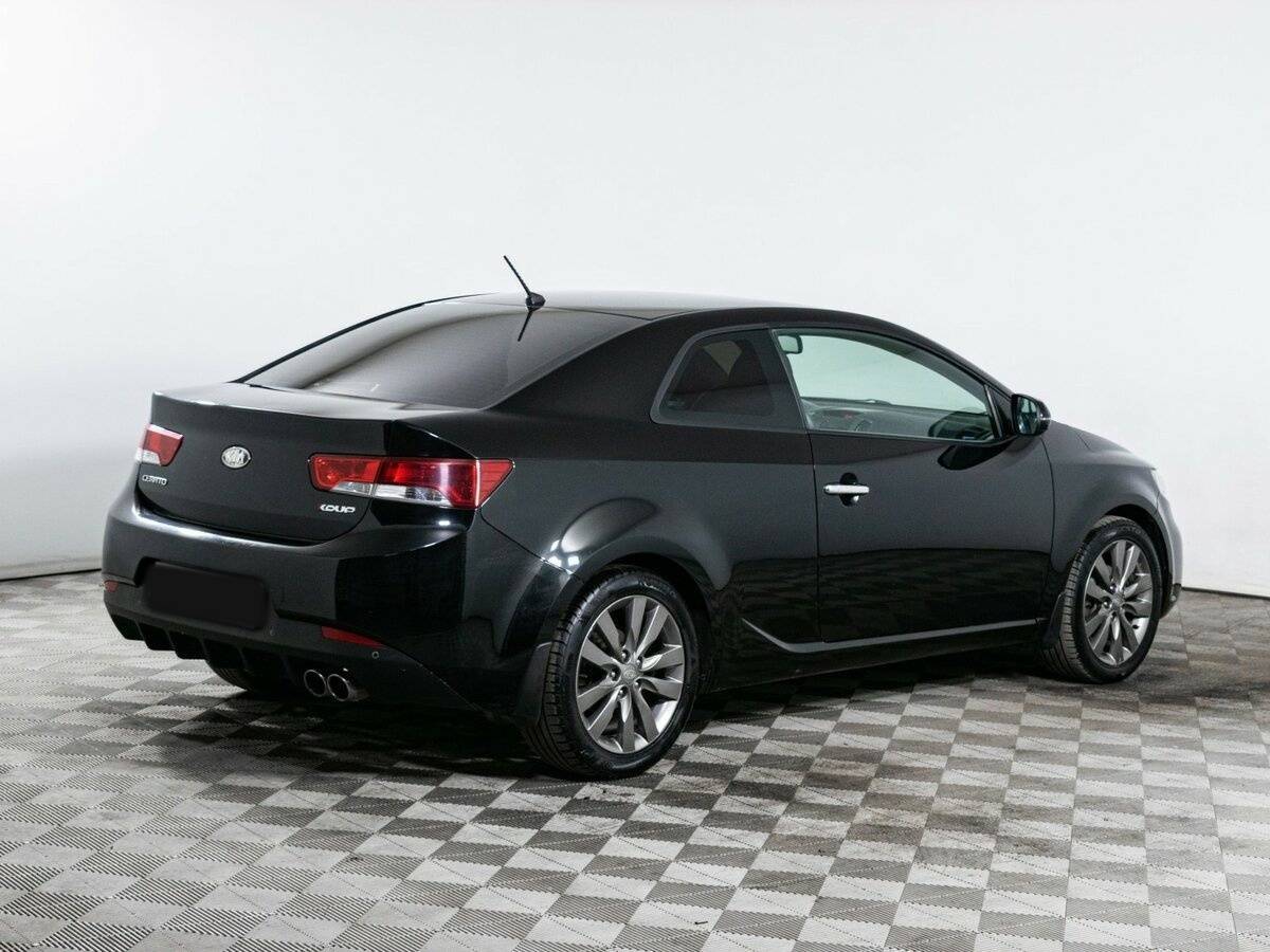 Kia Cerato 2012 года с пробегом. Фото: #4