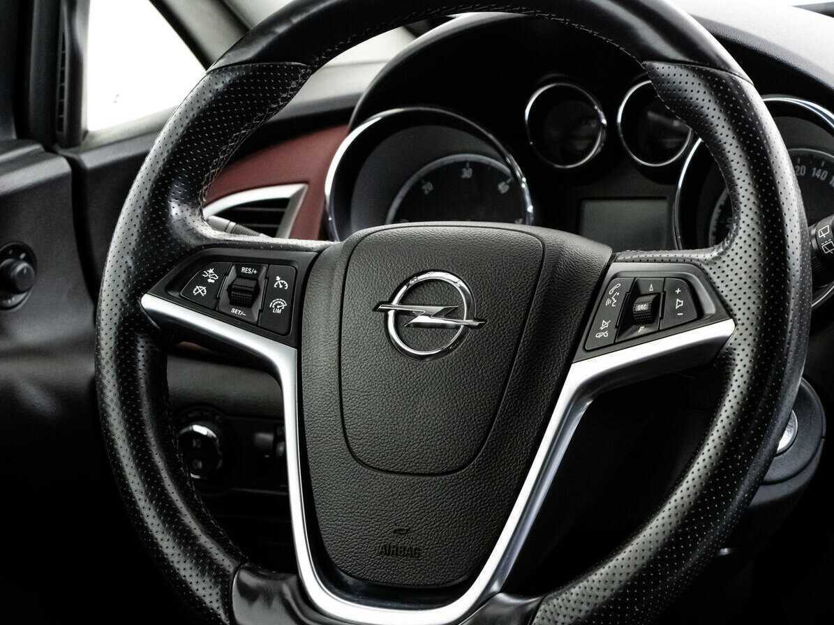 Opel Astra 2013 года с пробегом. Фото: #16