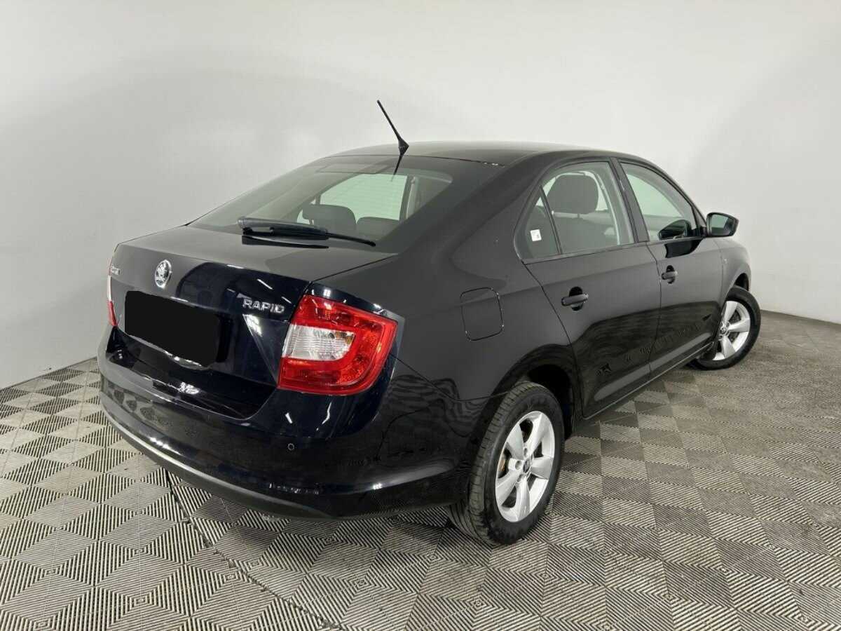 Skoda Rapid 2014 года с пробегом. Фото: #5