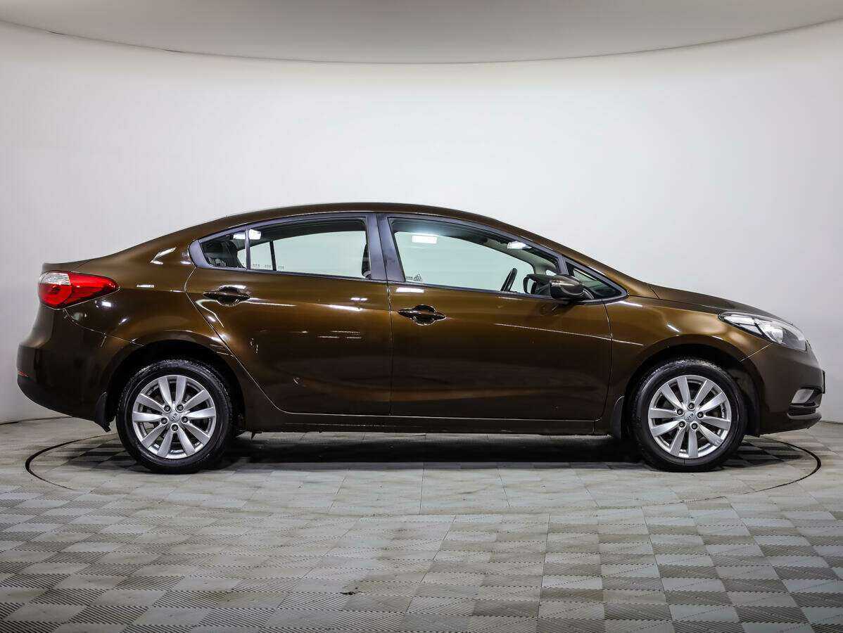 Kia Cerato 2015 года с пробегом. Фото: #2