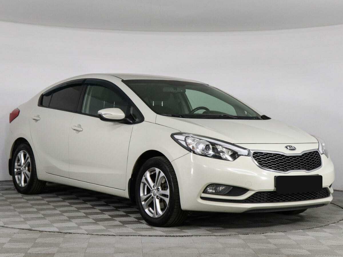 Kia Cerato 2013 года с пробегом. Фото: #2