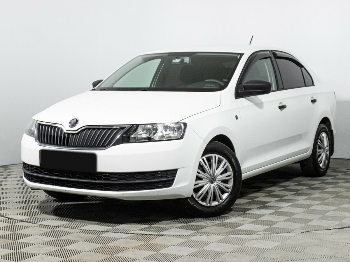Skoda Rapid 2015 года с пробегом. Посмотреть фото