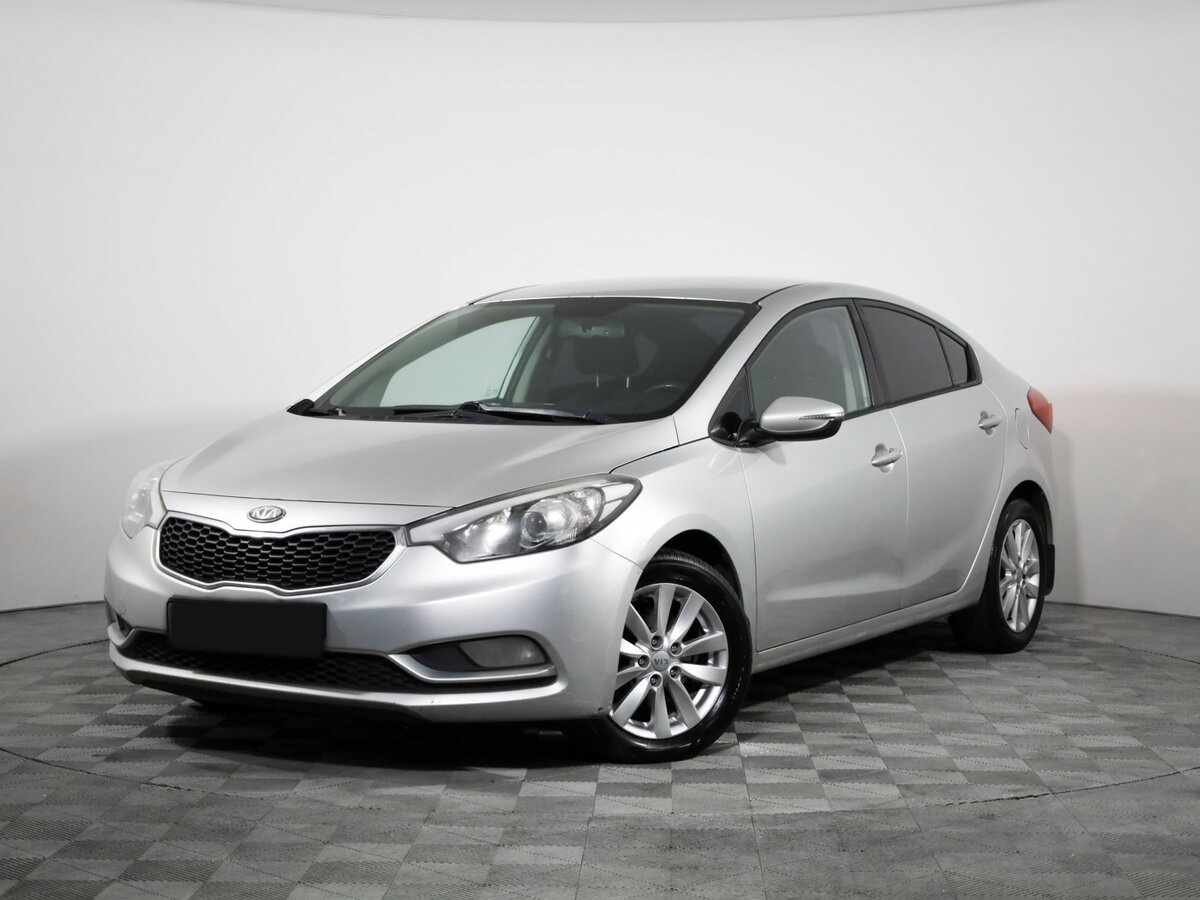 Kia Cerato 2013 года с пробегом. Посмотреть фото