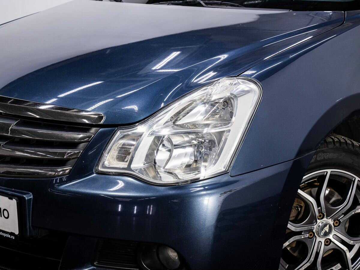 Nissan Almera 2013 года с пробегом. Фото: #6