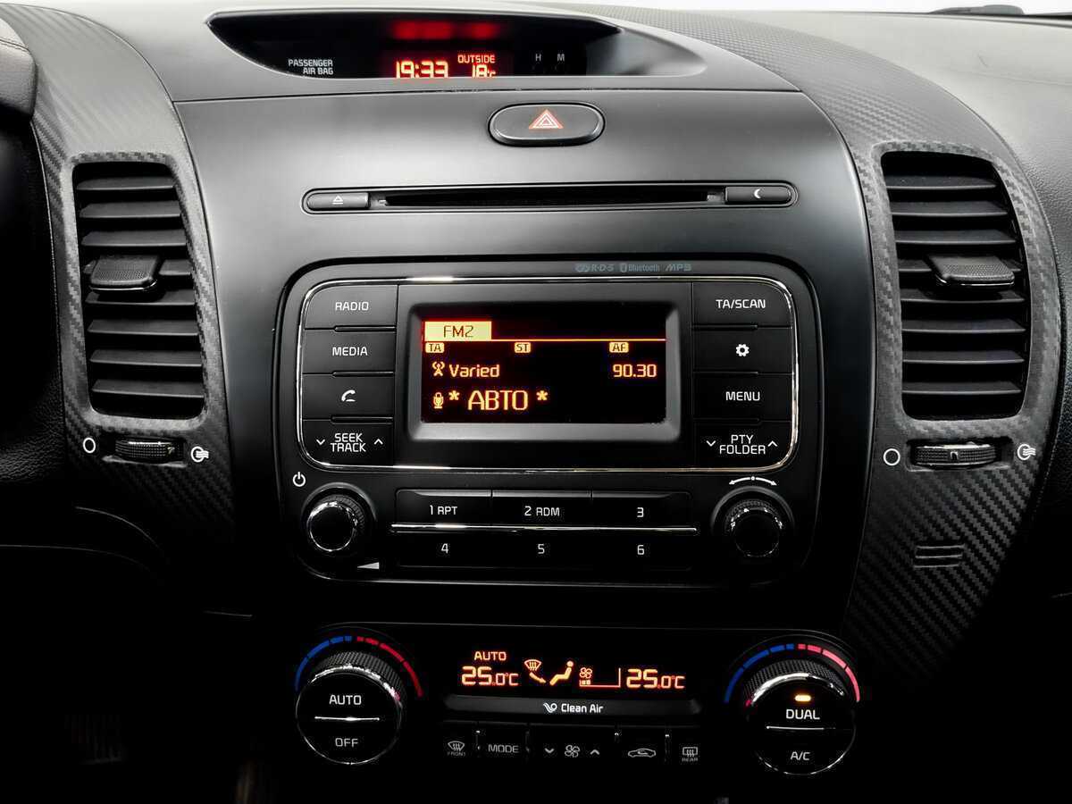 Kia Cerato 2013 года с пробегом. Фото: #14