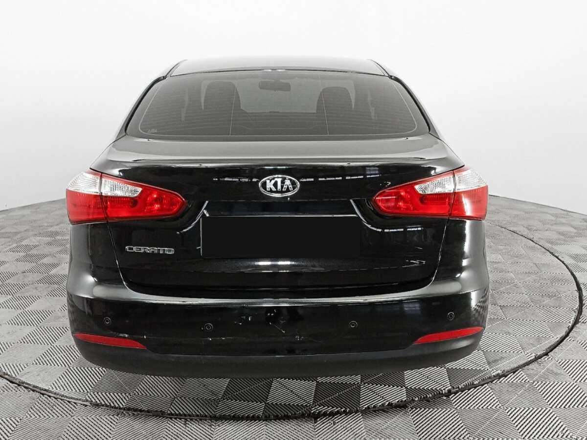Kia Cerato 2013 года с пробегом. Фото: #5