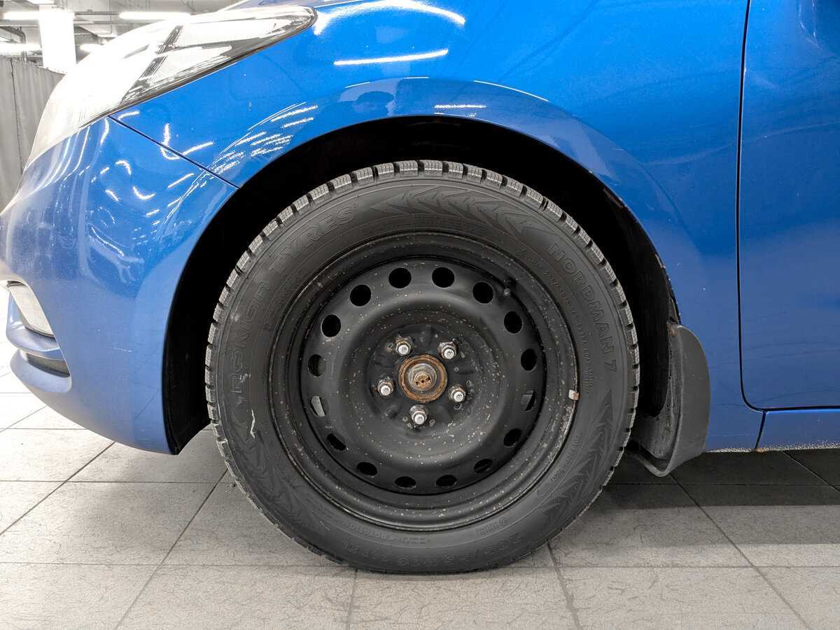 Kia Cerato 2013 года с пробегом. Фото: #17