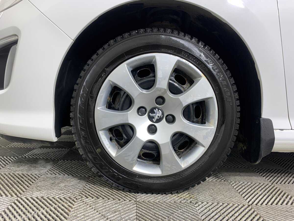 Peugeot 308 2012 года с пробегом. Фото: #8