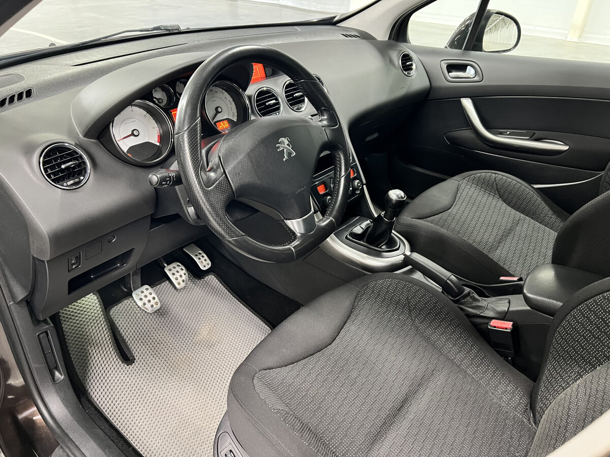 Peugeot 308 2012 года с пробегом. Фото: #14