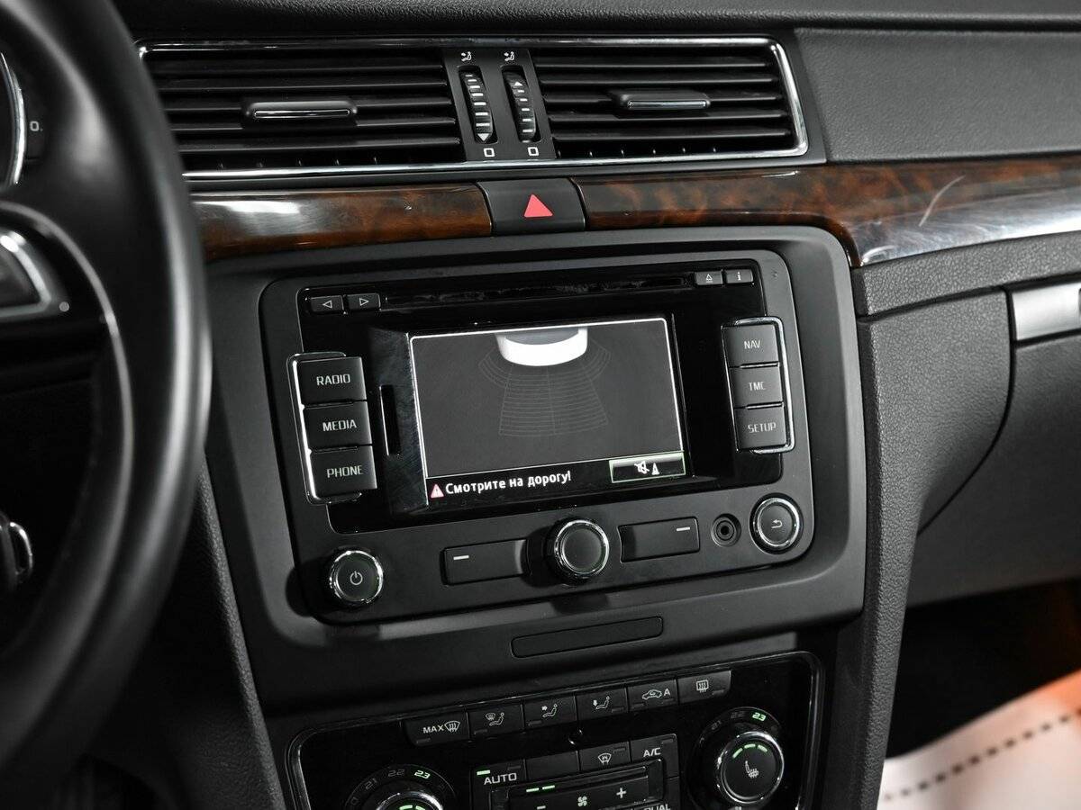 Skoda Superb 2013 года с пробегом. Фото: #9