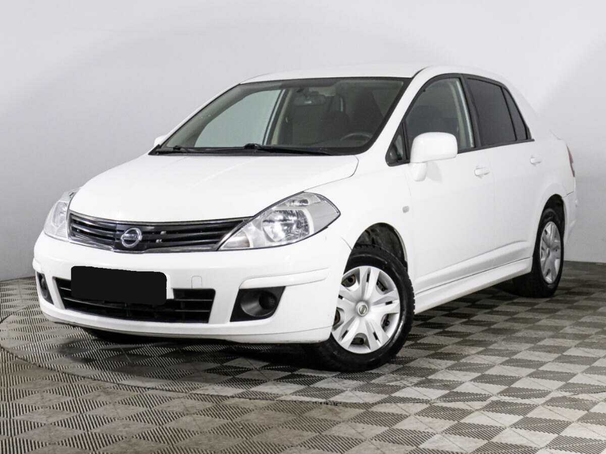 Nissan Tiida 2013 года с пробегом. Посмотреть фото