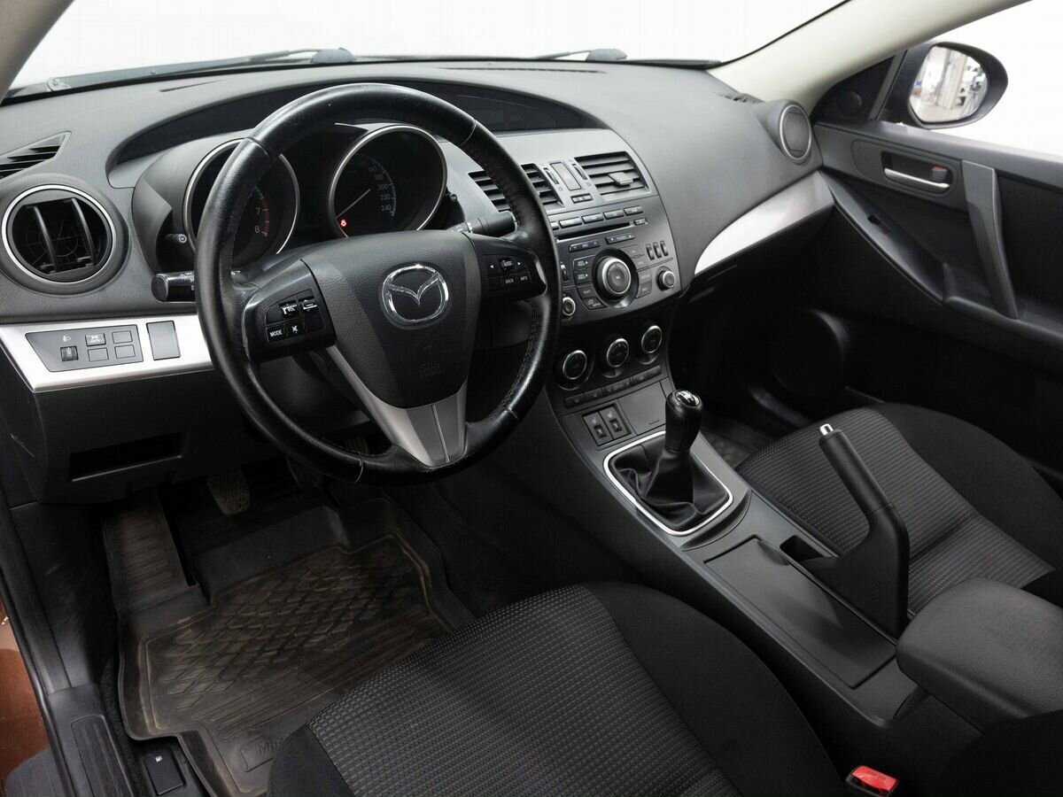 Mazda 3 2012 года с пробегом. Фото: #7