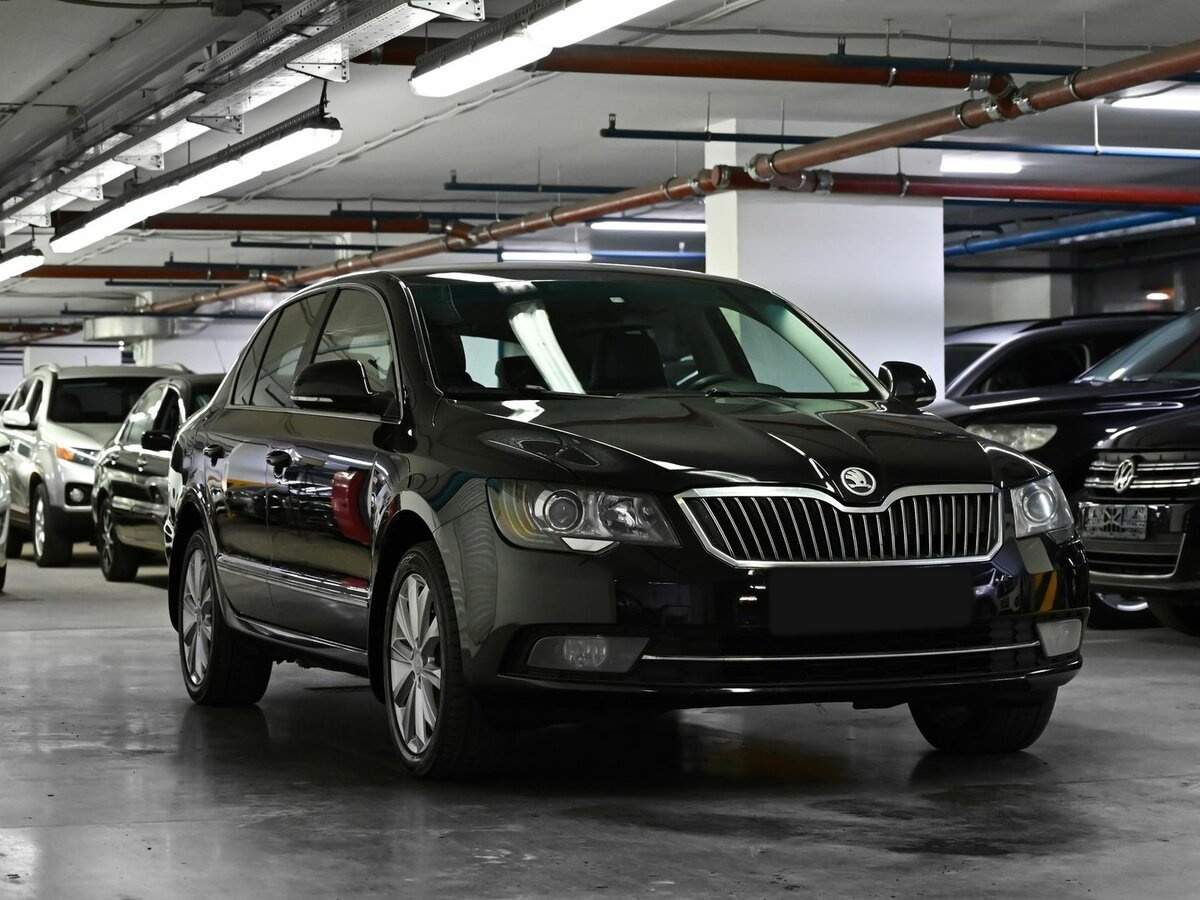 Skoda Superb 2013 года с пробегом. Фото: #1