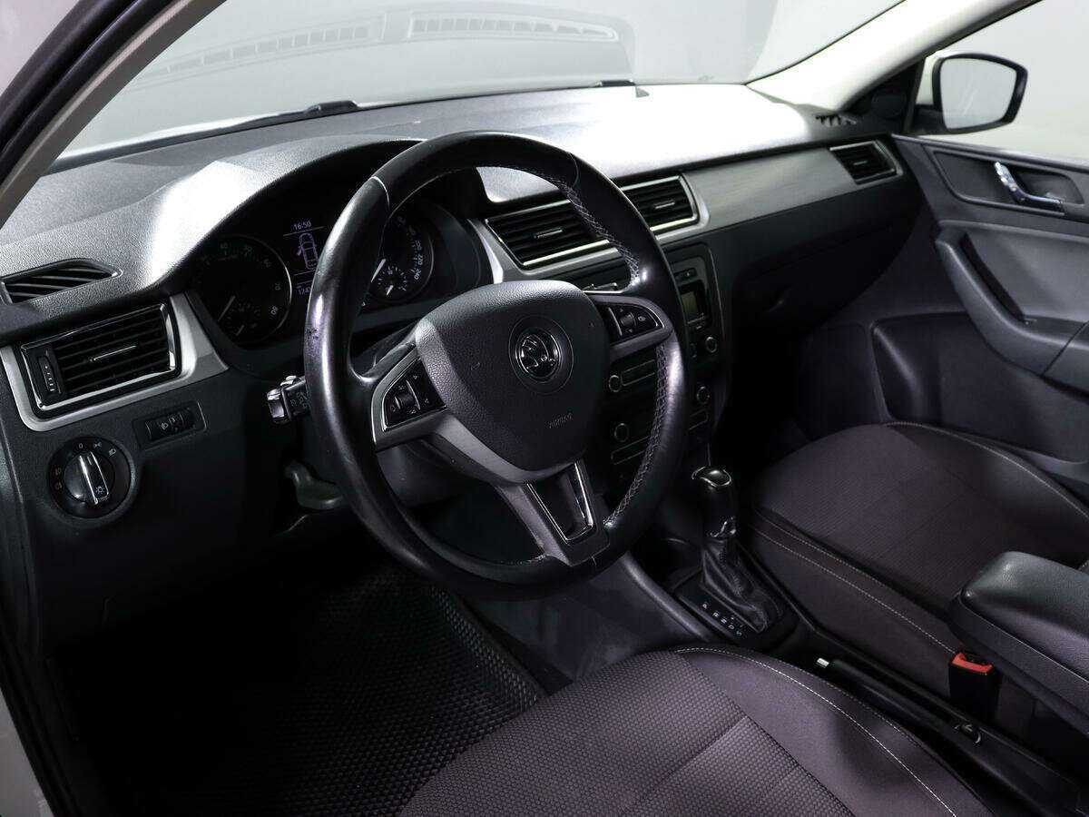 Skoda Rapid 2014 года с пробегом. Фото: #12