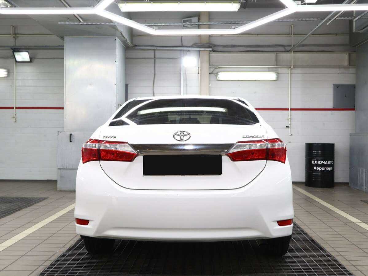 Toyota Corolla 2014 года с пробегом. Фото: #3