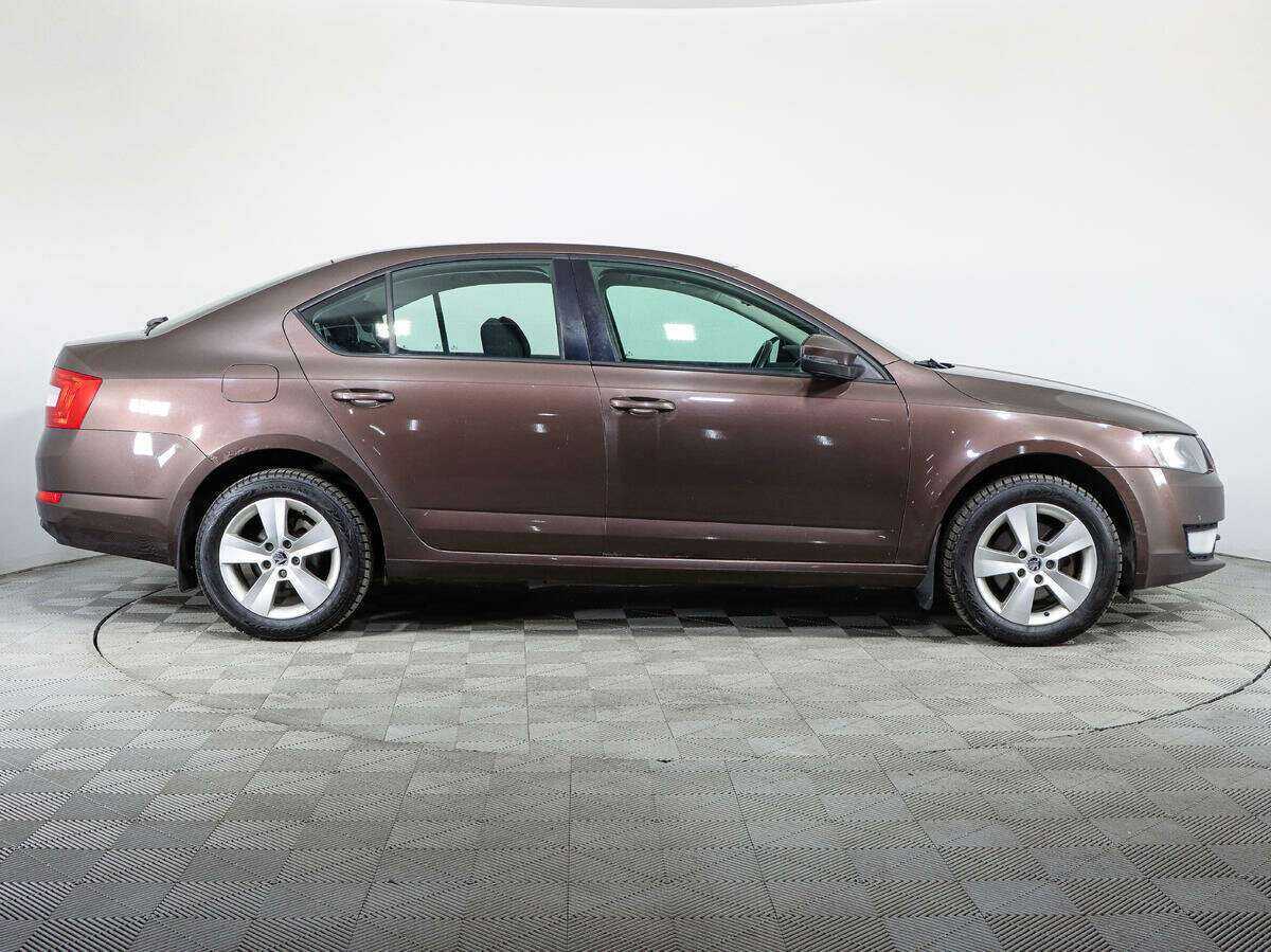 Skoda Octavia 2013 года с пробегом. Фото: #3