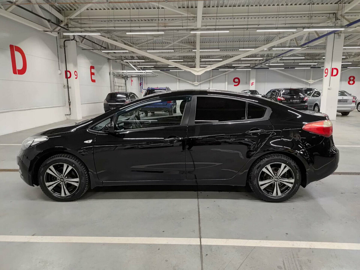 Kia Cerato 2013 года с пробегом. Фото: #7