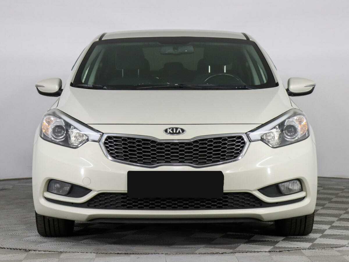 Kia Cerato 2013 года с пробегом. Фото: #1