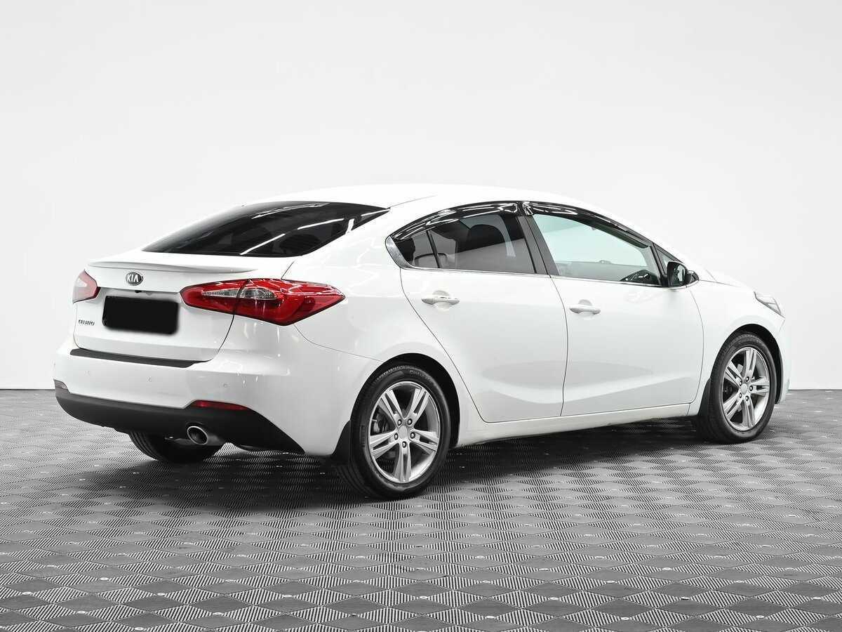 Kia Cerato 2013 года с пробегом. Фото: #2