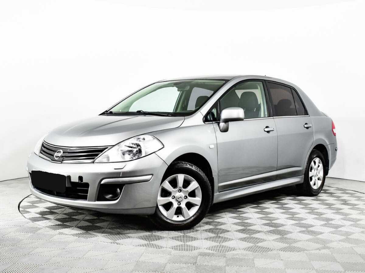 Nissan Tiida 2013 года с пробегом. Фото: #0
