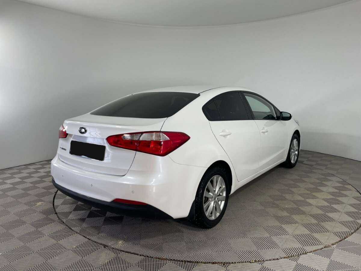 Kia Cerato 2014 года с пробегом. Фото: #3