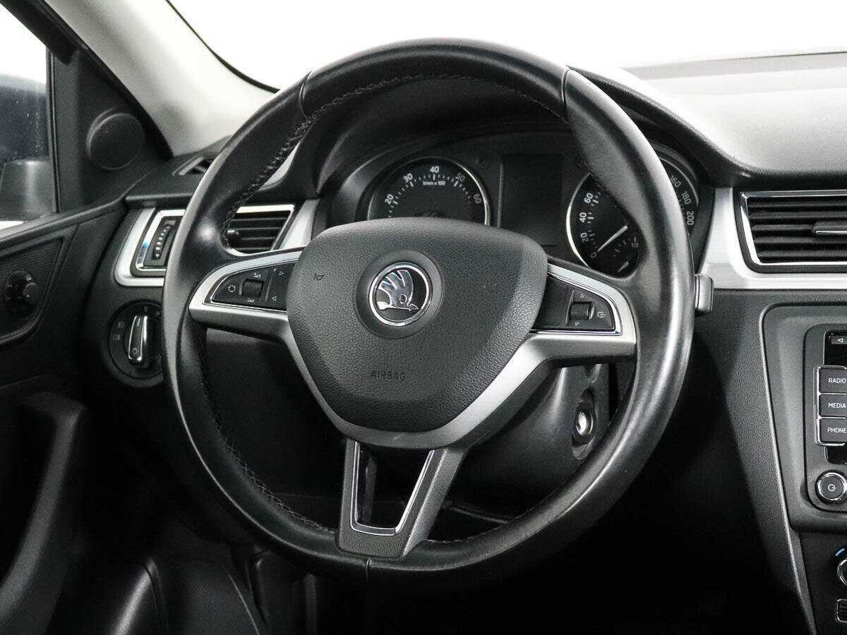 Skoda Rapid 2014 года с пробегом. Фото: #12