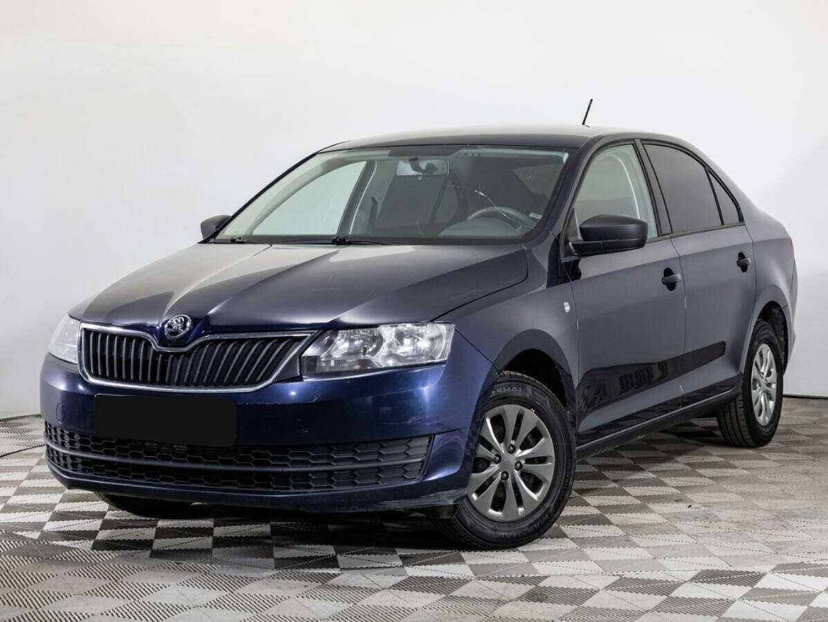 Skoda Rapid 2015 года с пробегом. Посмотреть фото