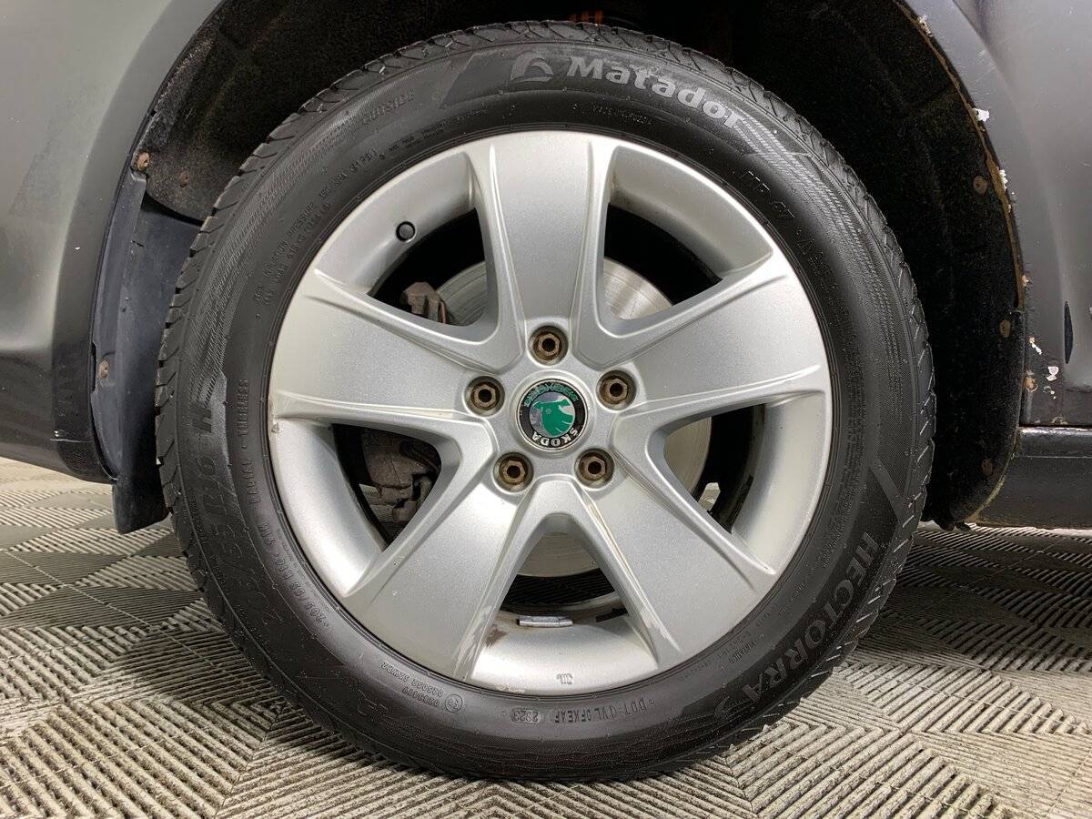 Skoda Octavia 2012 года с пробегом. Фото: #9