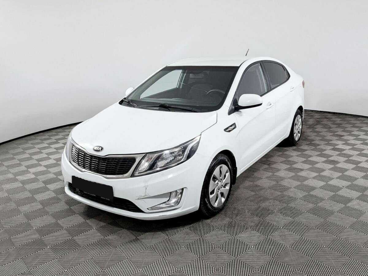 Kia Rio 2013 года с пробегом. Посмотреть фото