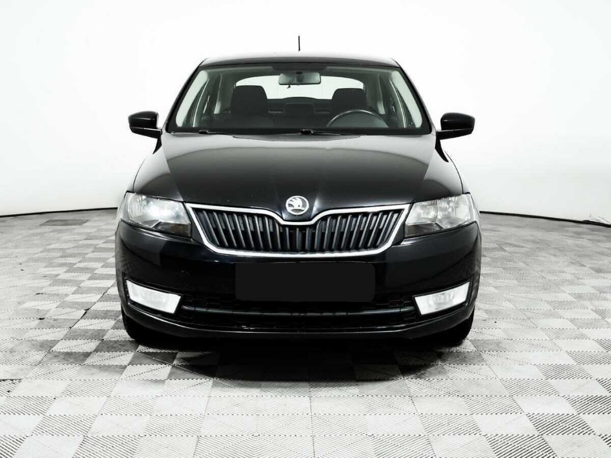 Skoda Rapid 2014 года с пробегом. Фото: #1