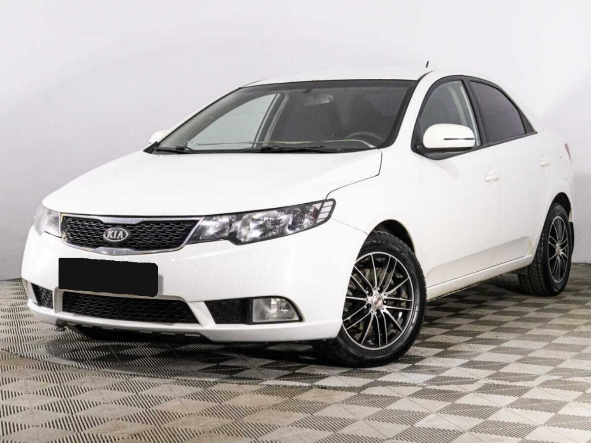 Kia Cerato 2012 года с пробегом. Посмотреть фото