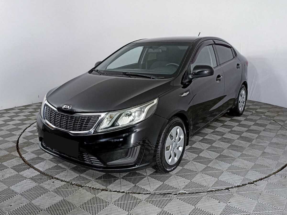 Kia Rio 2014 года с пробегом. Посмотреть фото